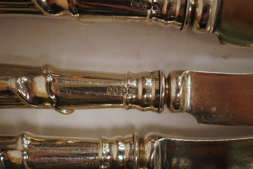 A set of six Victorian silver bladed dessert knives with loaded silver handles, by Lias & Lias, London, 1871, 21cm.